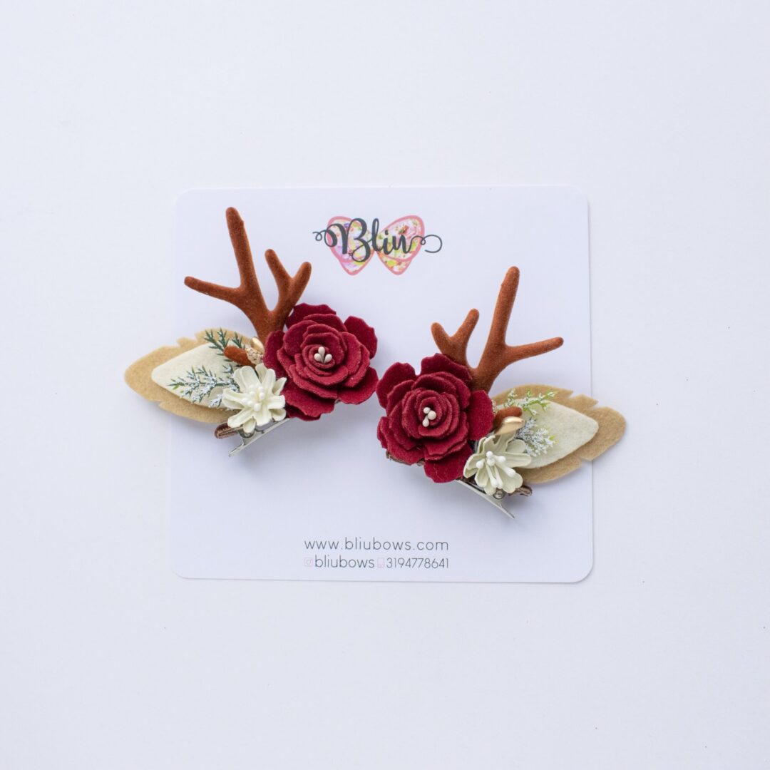 Pinzas con orejas de reno  y flores
